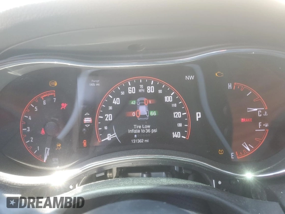 2015 Dodge Durango Citadel with VIN 1C4SDHET0FC873740, listed as a Copart auction lot 56067255 with 131,362 mi miles and Salvage title. Bid and sale history available at DreamBid. Image 9.