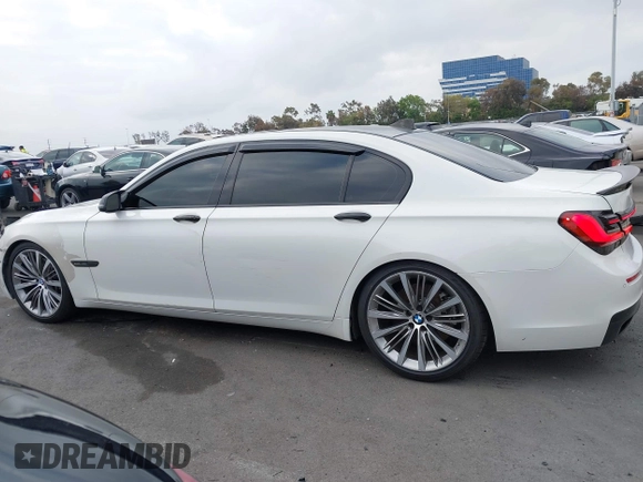2013 BMW 7 Series 750Li xDrive with VIN WBAYF8C5XDD139832, listed as a IAAI auction lot 42110322 with 149,453 mi miles and . Bid and sale history available at DreamBid. Image 14.
