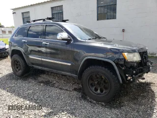 2011 Jeep Grand Cherokee Limited with VIN 1J4RR5GT2BC677640, listed as a Copart auction lot 68012754 with 138,208 mi miles and Salvage title. Bid and sale history available at DreamBid. Image 4.