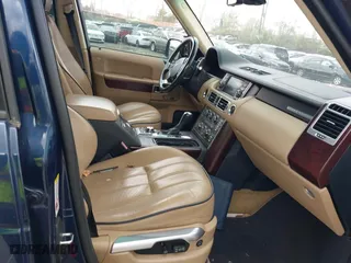2011 Land Rover Range Rover HSE LUX with VIN SALMF1D46BA353724, listed as a IAAI auction lot 42019083 with 173,728 mi miles. Bid and sale history available at carsss.com. Image 5.