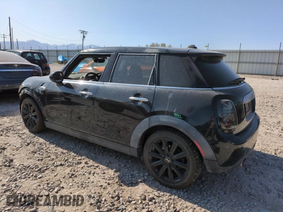 2015 MINI Hardtop 4 Door with VIN WMWXS5C51FT827202, listed as a Copart auction lot 59226065 with 130,647 mi miles and Salvage title. Bid and sale history available at DreamBid. Image 2.