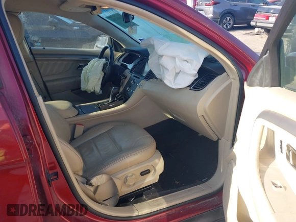 2014 Ford Taurus SEL with VIN 1FAHP2E80EG159131, listed as a IAAI auction lot 42004296 with 140,213 mi miles and . Bid and sale history available at DreamBid. Image 5.