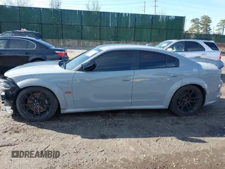 2022 Dodge Charger Scat Pack Widebody with VIN 2C3CDXGJ6NH176650, listed as a IAAI auction lot 41863122 with 34,569 mi miles and . Bid and sale history available at DreamBid. Image 14.