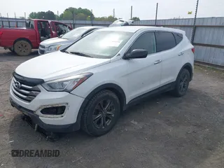 2014 Hyundai Santa Fe z VIN 5XYZTDLB1EG197765, wystawiony jako IAAI lot #41999374 z przebiegiem 172 430 mil mil oraz . Historia ofert i sprzedaży dostępna na DreamBid. Obrazek 19.