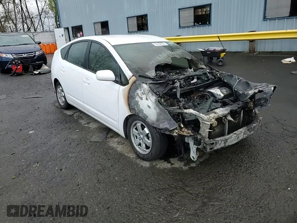 2004 Toyota Prius with VIN JTDKB22U040045296, listed as a Copart auction lot 52336425 with Not Provided miles and Non Repairable. Bid and sale history available at DreamBid. Image 11.
