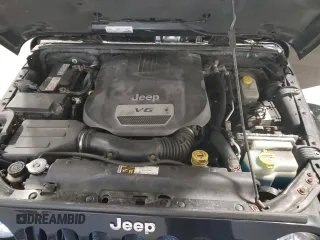 2015 Jeep Wrangler Unlimited Sahara with VIN 1C4BJWEG5FL611521, listed as a Copart auction lot 50609985 with 207,473 mi miles and Salvage Title. Bid and sale history available at carsss.com. Image 14.