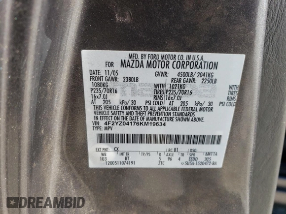 2006 Mazda Tribute S with VIN 4F2YZ04176KM19634, listed as a Copart auction lot 46796315 with 276,632 mi miles and Salvage Title. Bid and sale history available at DreamBid. Image 14.