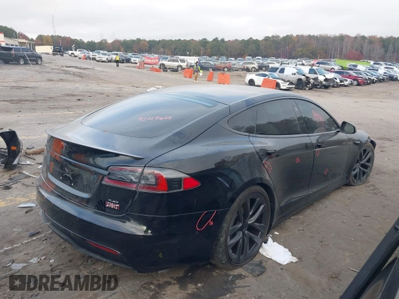 2022 Tesla Model S Plaid with VIN 5YJSA1E6XNF460235, listed as a IAAI auction lot 40951359 with 18,922 mi miles and . Bid and sale history available at DreamBid. Image 4.
