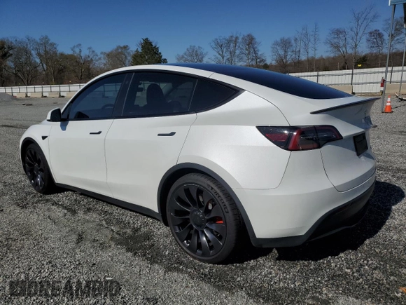 2023 Tesla Model Y Performance with VIN 7SAYGDEF4PF665873, listed as a Copart auction lot 49620705 with 39,239 mi miles and Salvage Title. Bid and sale history available at DreamBid. Image 2.
