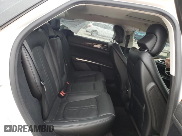 2015 Lincoln MKZ with VIN 3LN6L2J99FR602863, listed as a Copart auction lot 56679335 with 33,859 mi miles and Salvage title. Bid and sale history available at DreamBid. Image 10.