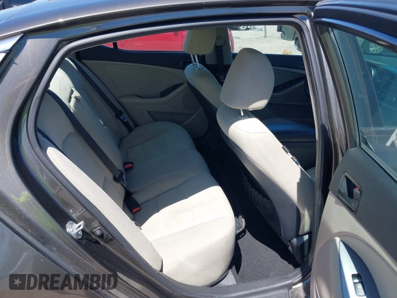 2014 Kia Optima LX with VIN 5XXGM4A71EG335165, listed as a IAAI auction lot 42052378 with 154,574 mi miles. Bid and sale history available at carsss.com. Image 8.