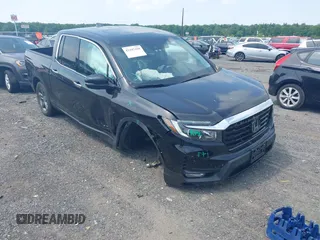2023 Honda Ridgeline RTL-E with VIN 5FPYK3F71PB022739, listed as a IAAI auction lot 42447428 with 19,702 mi miles and . Bid and sale history available at DreamBid. Image 6.