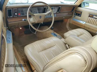 1982 Chrysler LeBaron z VIN 1C3BC45B6CG185348, wystawiony jako Copart lot #47381185 z przebiegiem 69 381 mil mil oraz Tytuł czysty. Historia ofert i sprzedaży dostępna na DreamBid. Obrazek 8.
