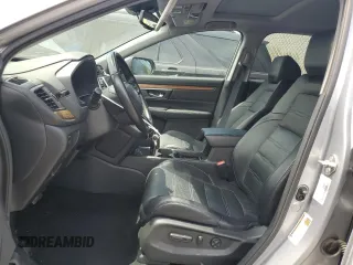 2018 Honda CR-V Touring z VIN 7FARW2H95JE012947, wystawiony jako Copart lot #64779925 z przebiegiem 20 561 mil mil oraz Szkoda całkowita • Salvage title. Historia ofert i sprzedaży dostępna na DreamBid. Obrazek 7.