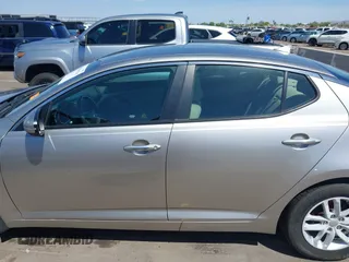2013 Kia Optima LX with VIN KNAGM4A74D5423255, listed as a IAAI auction lot 42065230 with 116,589 mi miles. Bid and sale history available at carsss.com. Image 14.