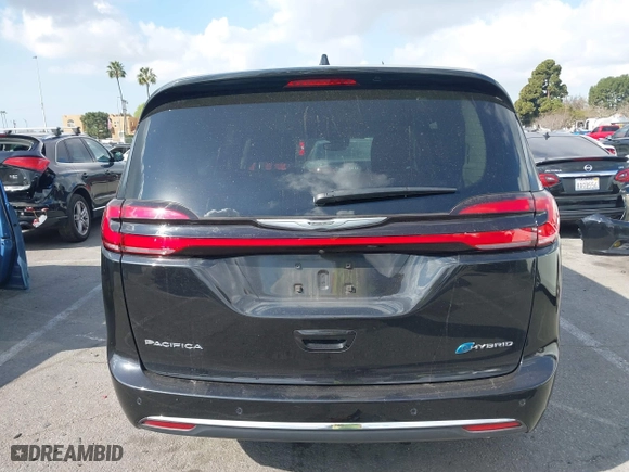 2023 Chrysler Pacifica Hybrid Touring L with VIN 2C4RC1L78PR543402, listed as a IAAI auction lot 41536710 with 35,867 mi miles. Bid and sale history available at carsss.com. Image 17.