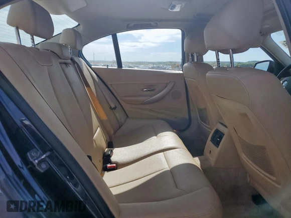 2015 BMW 3 Series 320i with VIN WBA3B1C58FK140327, listed as a Copart auction lot 57999675 with 124,437 mi miles and Salvage title. Bid and sale history available at DreamBid. Image 10.