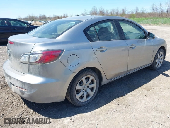 2012 Mazda Mazda3 i Sport with VIN JM1BL1UG6C1516181, listed as a IAAI auction lot 42130825 with 140,868 mi miles. Bid and sale history available at carsss.com. Image 4.