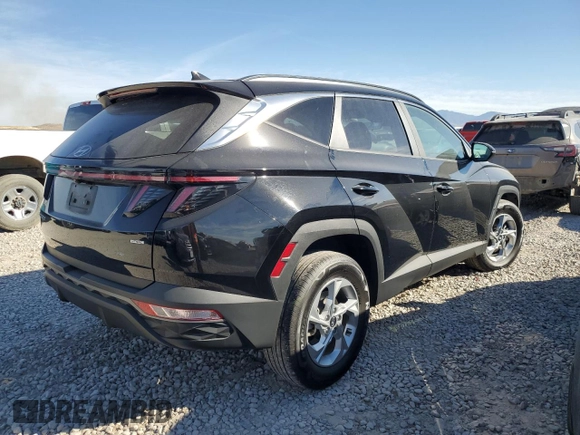 2022 Hyundai Tucson SEL with VIN 5NMJBCAE5NH030189, listed as a Copart auction lot 75327374 with 33,864 mi miles and Salvage Title. Bid and sale history available at DreamBid. Image 3.