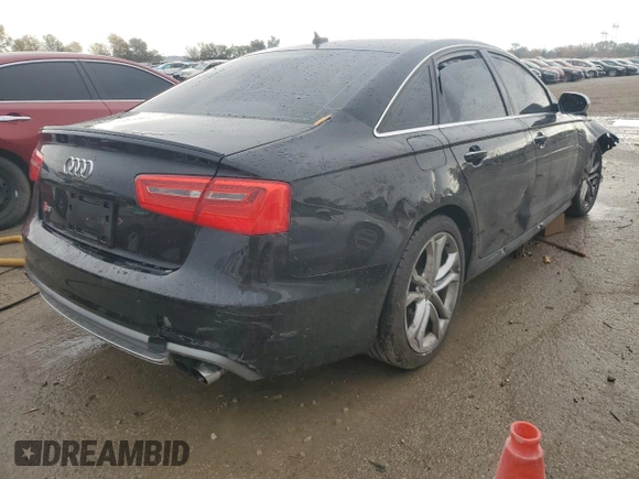 2014 Audi S6 Prestige z VIN WAUF2AFC6EN101479, wystawiony jako Copart lot #77700524 z przebiegiem 104 652 mil mil oraz Szkody całkowita. Historia ofert i sprzedaży dostępna na DreamBid. Obrazek 3.