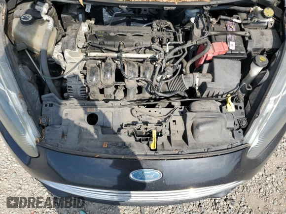 2015 Ford Fiesta S z VIN 3FADP4AJ2FM122902, wystawiony jako Copart lot #57916245 z przebiegiem 126 535 mil mil oraz Czysty tytuł • Clean title. Historia ofert i sprzedaży dostępna na DreamBid. Obrazek 11.
