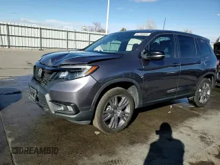 2019 Honda Passport EX-L with VIN 5FNYF8H53KB027391, listed as a Copart auction lot 87193204 with 92,870 mi miles and Salvage title. Bid and sale history available at DreamBid. Image 14.