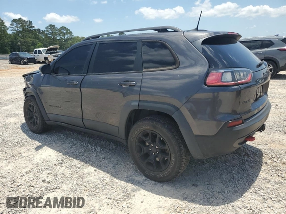 2019 Jeep Cherokee Trailhawk с VIN 1C4PJMBX5KD278692, выставлен на аукционе Copart как лот 56912285 с пробегом 110 964 миль миль и Списание • Salvage title. История ставок и продаж доступна на DreamBid. Изображение 2.