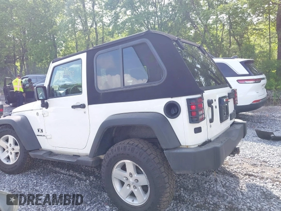 2009 Jeep Wrangler X with VIN 1J4FA24119L727658, listed as a IAAI auction lot 42372855 with 145,450 mi miles and . Bid and sale history available at DreamBid. Image 14.