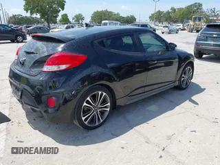 2016 Hyundai Veloster Turbo z VIN KMHTC6AEXGU281207, wystawiony jako IAAI lot #42197497 z przebiegiem 107 431 mil mil oraz . Historia ofert i sprzedaży dostępna na DreamBid. Obrazek 4.