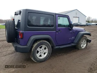 2017 Jeep Wrangler Willys Wheeler with VIN 1C4AJWAG0HL641188, listed as a Copart auction lot 52814005 with 94,959 mi miles and Salvage Title. Bid and sale history available at DreamBid. Image 3.