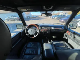 2005 Mercedes-Benz G-Class with VIN WDCYR49EX5X160815, listed as a Copart auction lot 85263464 with 99,770 mi miles and Clean Title. Bid and sale history available at carsss.com. Image 7.