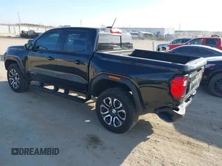 2024 GMC Canyon 4WD AT4 with VIN 1GTP6DEK9R1118926, listed as a IAAI auction lot 40998280 with 10,958 mi miles. Bid and sale history available at carsss.com. Image 3.