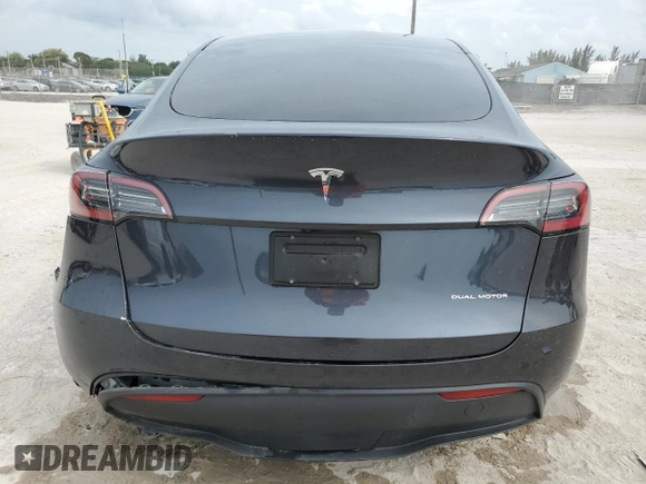 2024 Tesla Model Y Long Range with VIN 7SAYGDEE3RA253354, listed as a Copart auction lot 50524105 with 10,353 mi miles and Salvage Title. Bid and sale history available at DreamBid. Image 6.