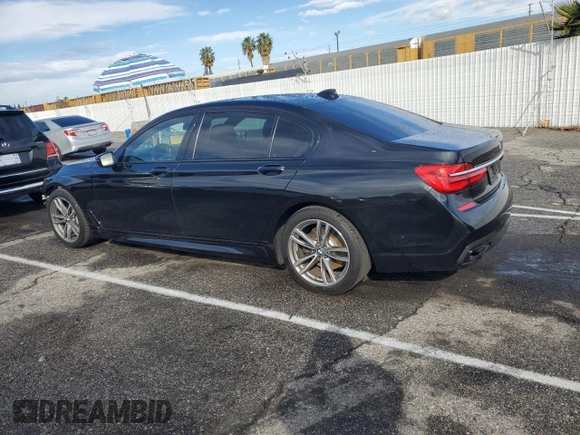 2017 BMW 7 Series 740i with VIN WBA7E2C59HG739693, listed as a Copart auction lot 42599835 with 90,061 mi miles and Salvage Title. Bid and sale history available at carsss.com. Image 2.
