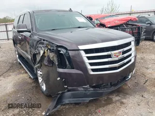 2015 Cadillac Escalade Premium z VIN 1GYS4NKJXFR515862, wystawiony jako IAAI lot #41814804 z przebiegiem 140 476 mil mil oraz . Historia ofert i sprzedaży dostępna na DreamBid. Obrazek 1.