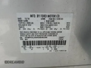 2019 Ford Edge SEL with VIN 2FMPK4J90KBB40298, listed as a Copart auction lot 56953585 with 110,639 mi miles and Salvage title. Bid and sale history available at DreamBid. Image 13.