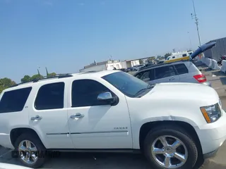 2013 Chevrolet Tahoe LTZ with VIN 1GNSKCE04DR374682, listed as a IAAI auction lot 42779526 with 139,533 mi miles and . Bid and sale history available at DreamBid. Image 13.