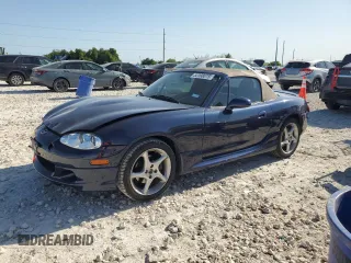 2002 Mazda MX-5 Miata Cloth z VIN JM1NB353720231873, wystawiony jako Copart lot #52398015 z przebiegiem 90 077 mil mil oraz Szkoda całkowita • Salvage title. Historia ofert i sprzedaży dostępna na DreamBid. Obrazek 1.