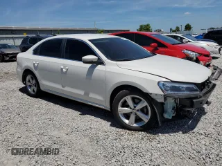 2015 Volkswagen Passat SE with VIN 1VWBV7A30FC065687, listed as a Copart auction lot 63218375 with 124,286 mi miles and Salvage title. Bid and sale history available at DreamBid. Image 4.
