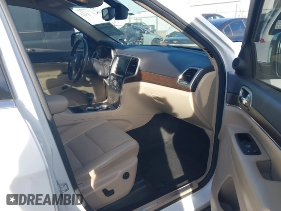 2015 Jeep Grand Cherokee Limited with VIN 1C4RJEBG8FC822774, listed as a IAAI auction lot 40939140 with 146,609 mi miles. Bid and sale history available at carsss.com. Image 5.