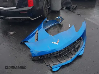 2016 Chevrolet Corvette Z51 3LT z VIN 1G1YM2D74G5116883, wystawiony jako IAAI lot #42160585 z przebiegiem 25 939 mil mil oraz . Historia ofert i sprzedaży dostępna na DreamBid. Obrazek 12.