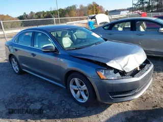 2014 Volkswagen Passat Wolfsburg Edition with VIN 1VWAT7A3XEC026119, listed as a IAAI auction lot 40940817 with 151,389 mi miles and . Bid and sale history available at DreamBid. Image 1.