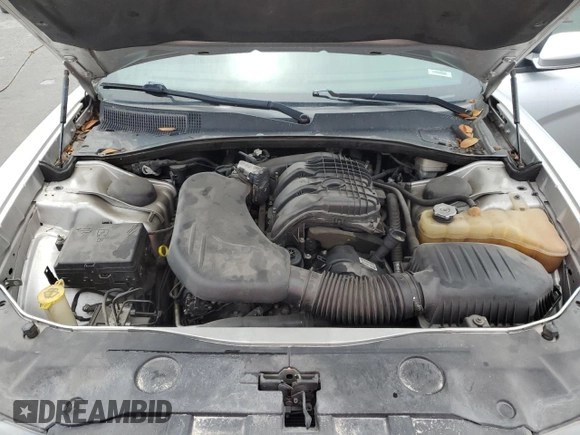 2012 Dodge Charger SE with VIN 2C3CDXBG4CH203207, listed as a Copart auction lot 56910395 with 156,016 mi miles and Salvage Title. Bid and sale history available at DreamBid. Image 11.