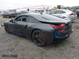 2015 BMW i8 with VIN WBY2Z2C56FVX64947, listed as a IAAI auction lot 41480193 with 51,366 mi miles. Bid and sale history available at carsss.com. Image 3.