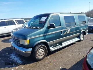 1995 Ford Econoline Cargo with VIN 1FDEE14H5SHB67418, listed as a IAAI auction lot 41551535 with 150,185 mi miles and . Bid and sale history available at DreamBid. Image 2.