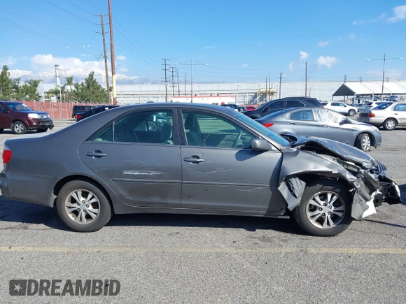 2005 Toyota Camry LE with VIN 4T1BF32K25U603812, listed as a IAAI auction lot 41740671 with 242,316 mi miles and . Bid and sale history available at DreamBid. Image 14.
