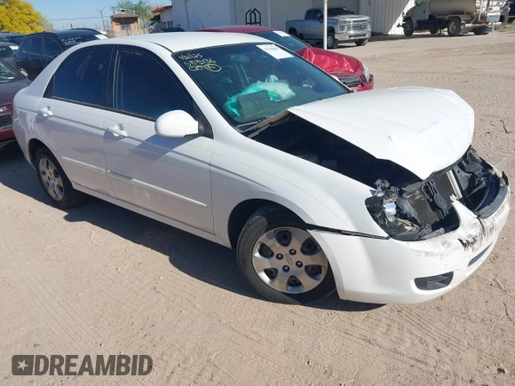 2009 Kia Spectra EX with VIN KNAFE222695588022, listed as a IAAI auction lot 42106609 with 153,688 mi miles. Bid and sale history available at carsss.com. Image 1.