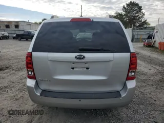 2012 Kia Sedona LX with VIN KNDMG4C79C6496785, listed as a Copart auction lot 73310344 with 130,243 mi miles and Salvage Title. Bid and sale history available at carsss.com. Image 6.