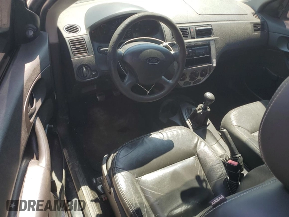 2005 Ford Focus S z VIN 3FAFP31N65R153304, wystawiony jako Copart lot #54253215 z przebiegiem 148 707 mil mil oraz Szkoda całkowita • Salvage title. Historia ofert i sprzedaży dostępna na DreamBid. Obrazek 8.