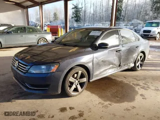 2015 Volkswagen Passat 1.8T S with VIN 1VWAT7A31FC050357, listed as a IAAI auction lot 41487346 with 171,205 mi miles. Bid and sale history available at carsss.com. Image 2.